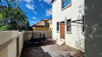 Backyard of property in Homes Haven