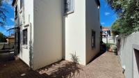 Backyard of property in Homes Haven