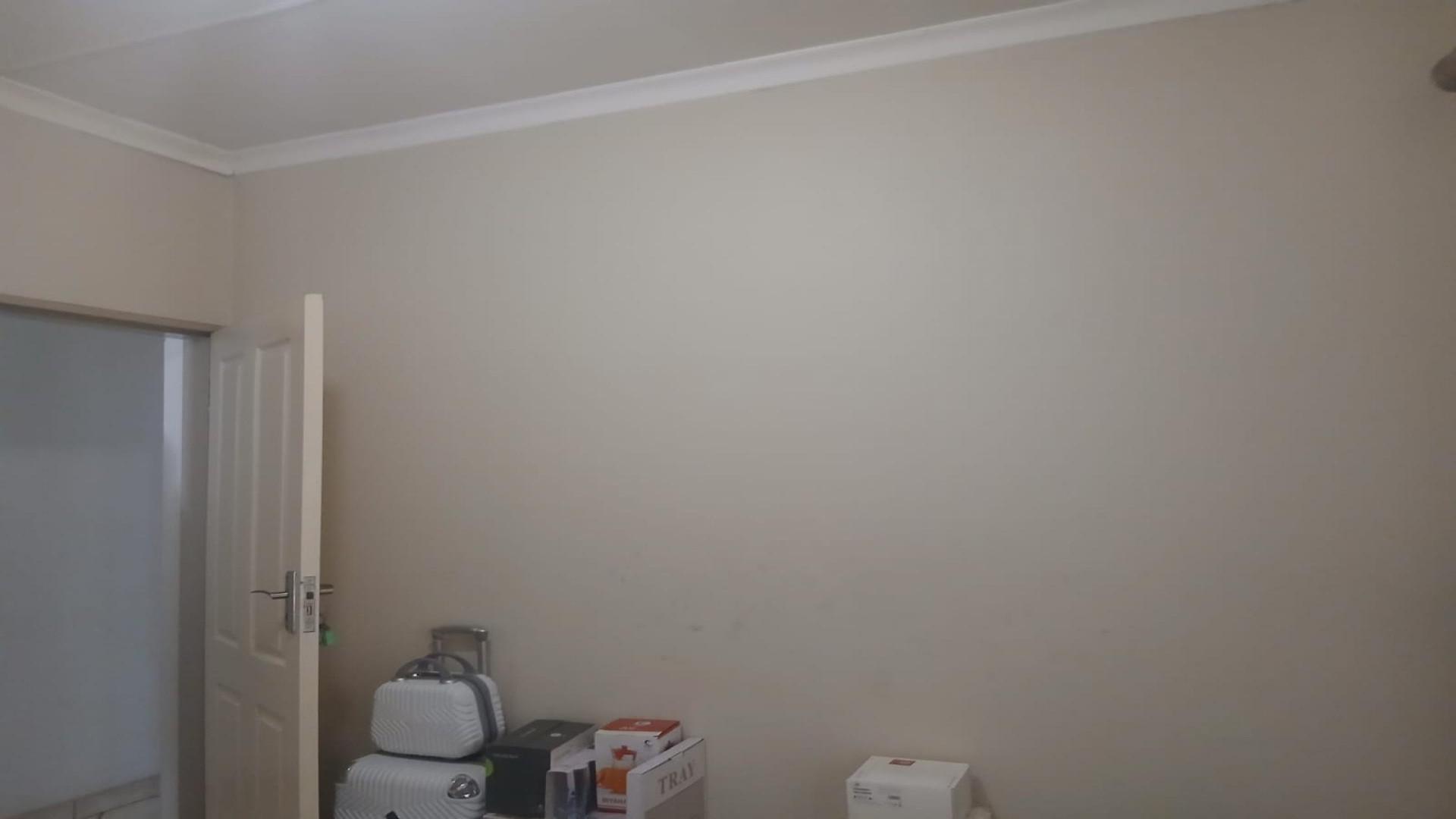 Bed Room 1 of property in Rustenburg