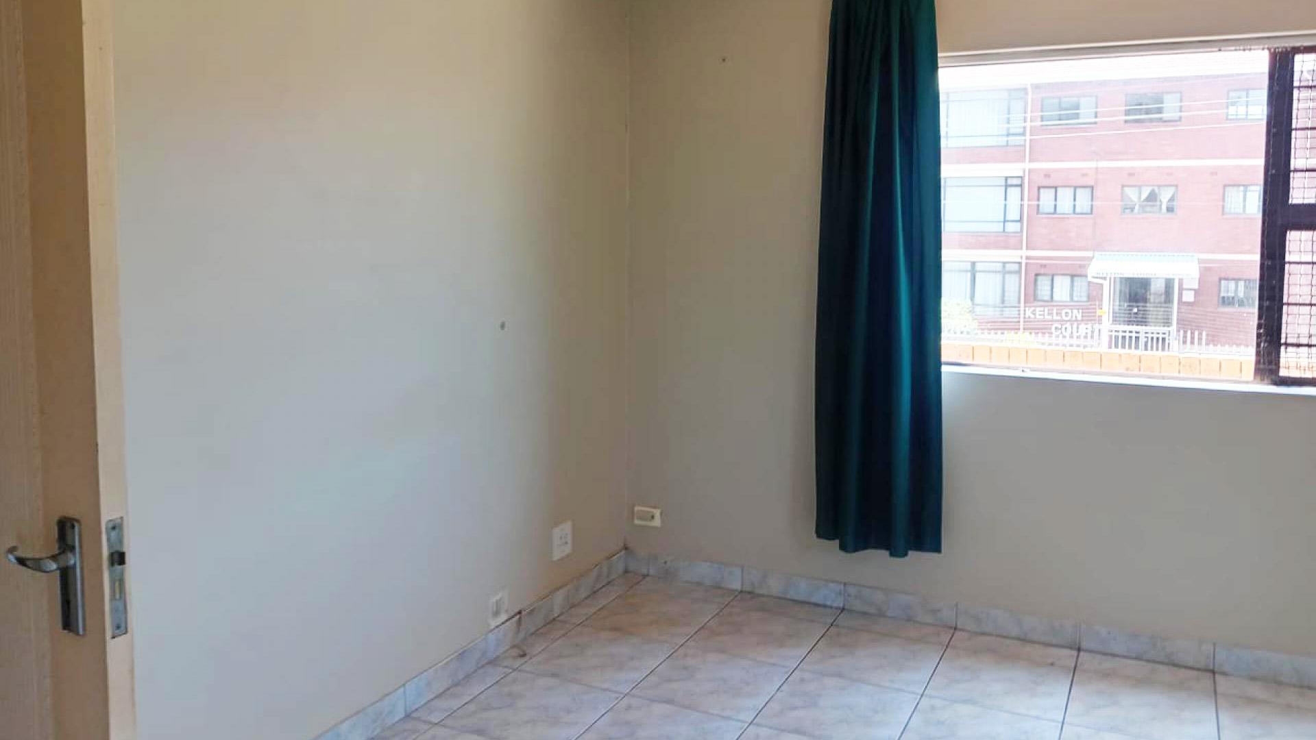 Main Bedroom of property in Amanzimtoti 