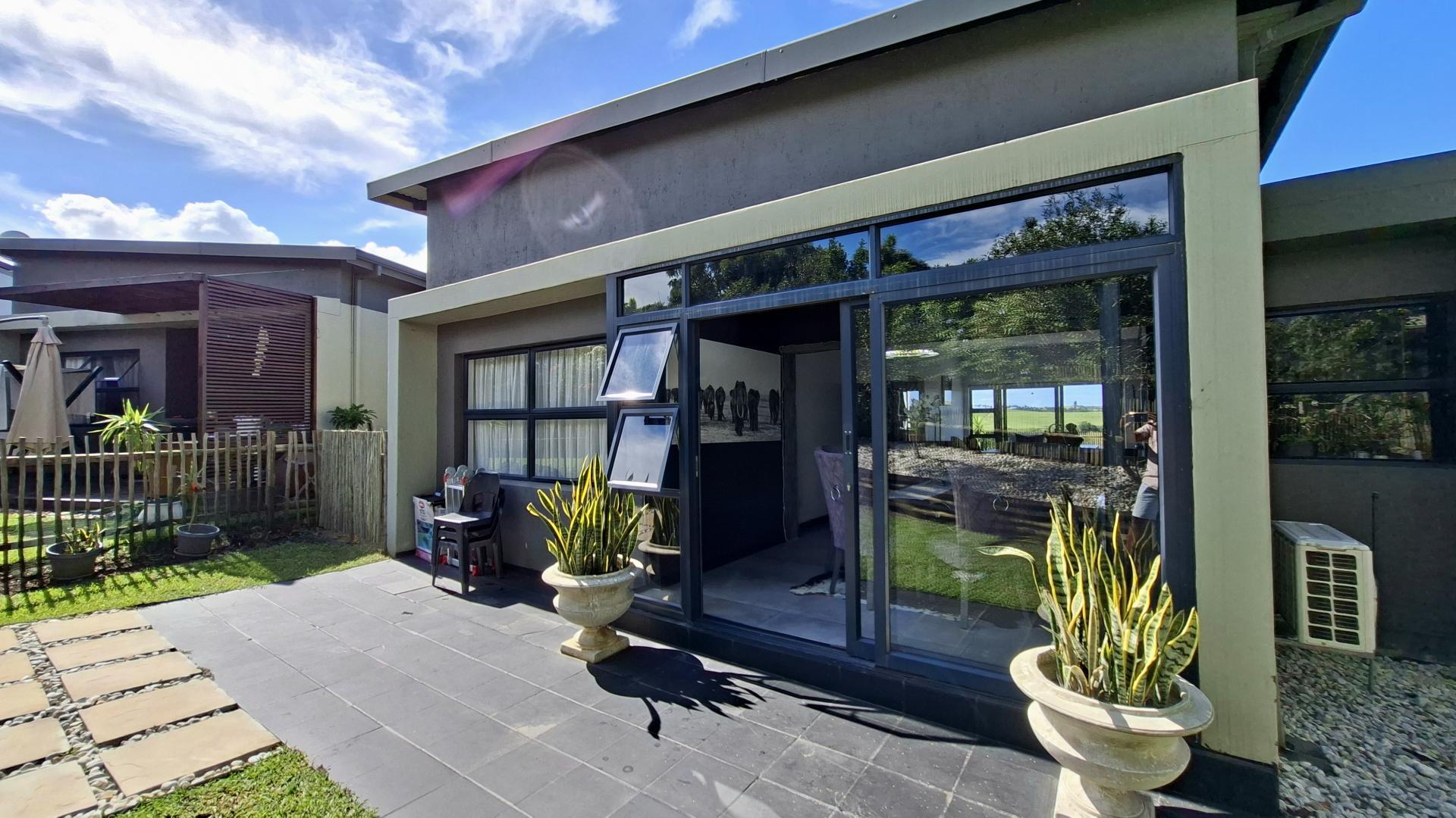Patio of property in Palm Lakes Family Estate