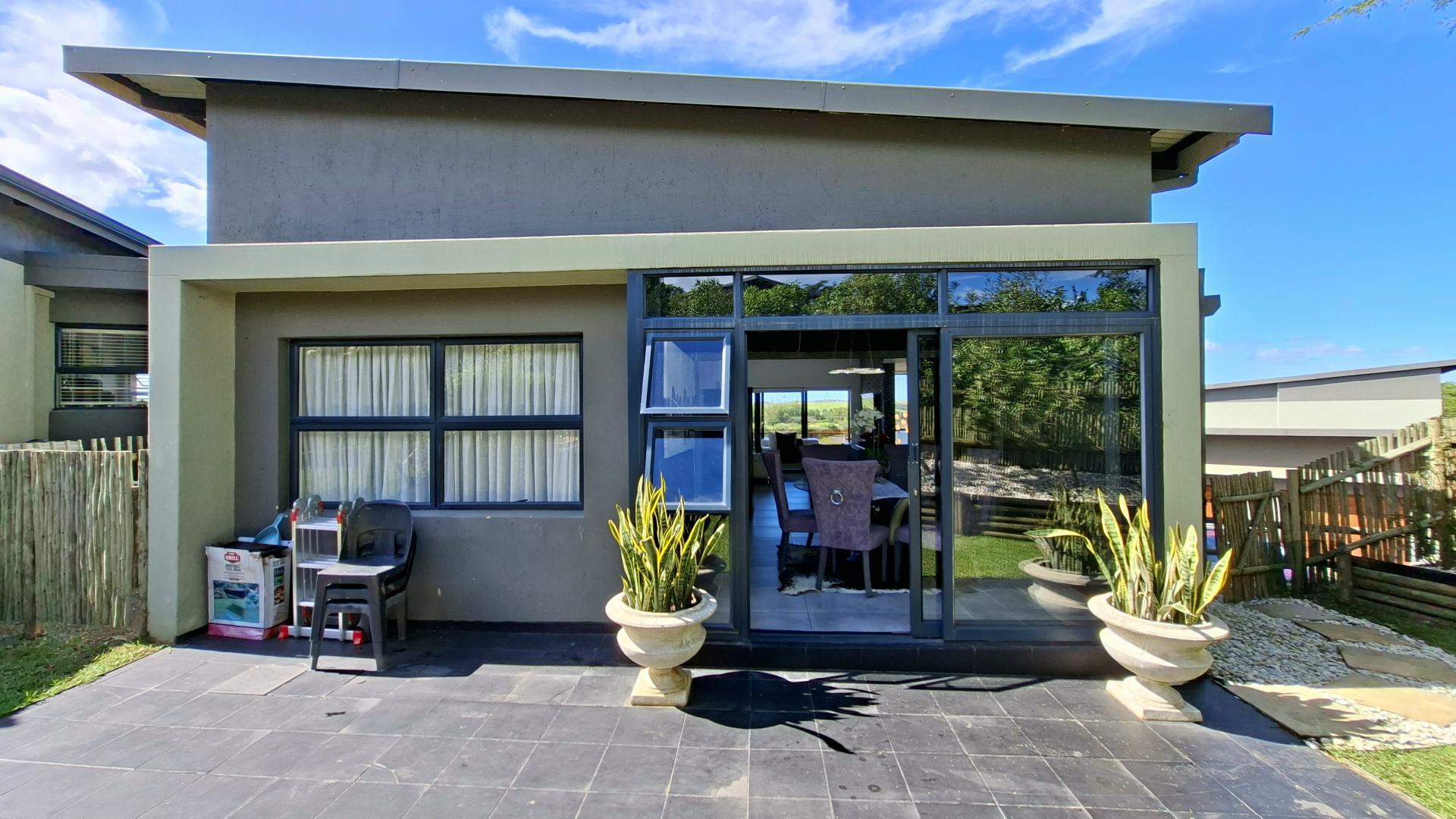 Patio of property in Palm Lakes Family Estate