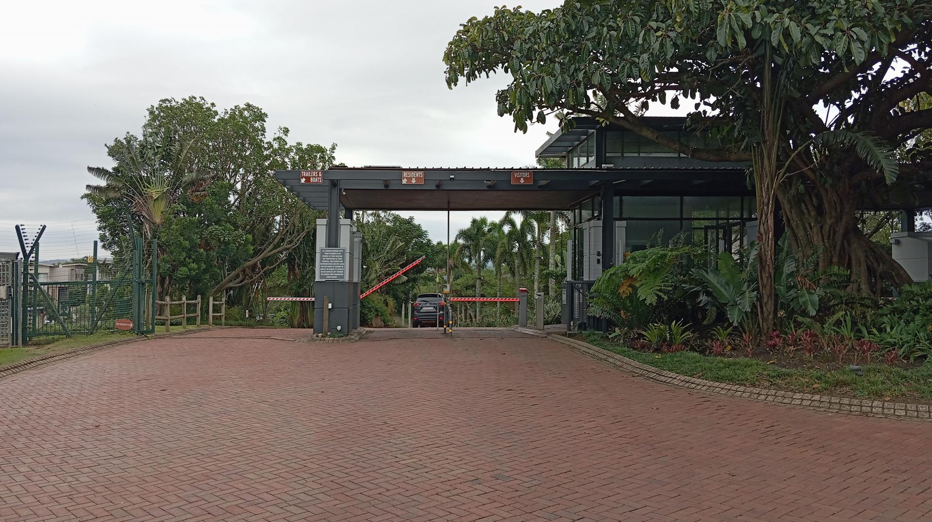 Front View of property in Palm Lakes Family Estate