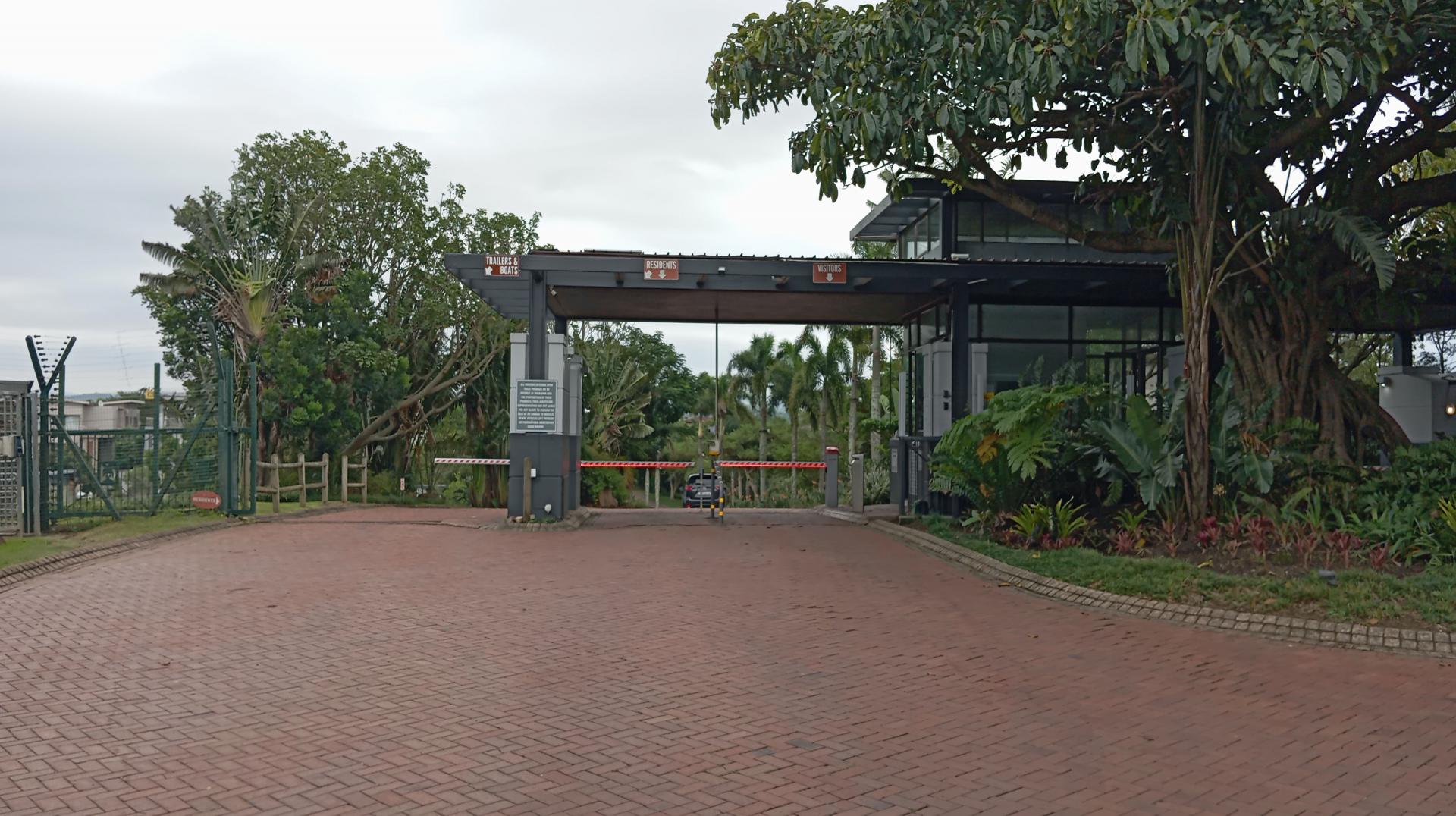 Front View of property in Palm Lakes Family Estate