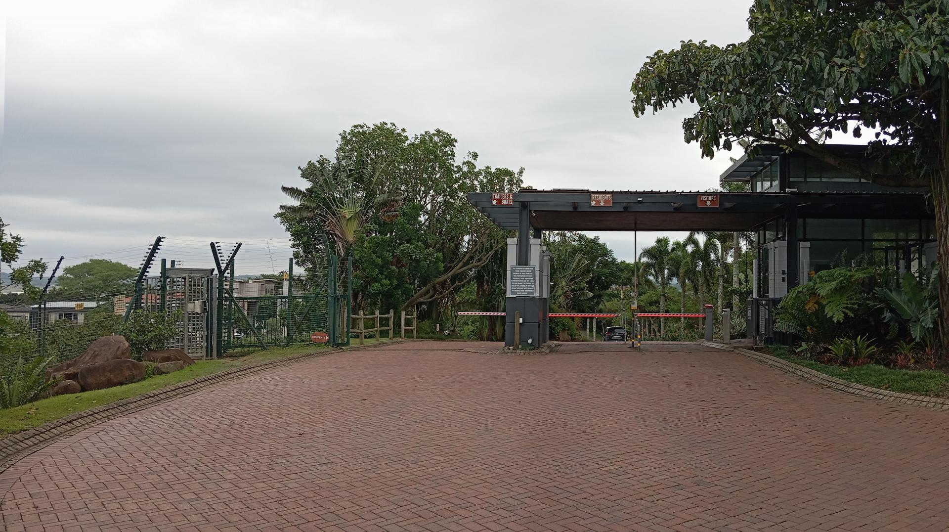 Front View of property in Palm Lakes Family Estate