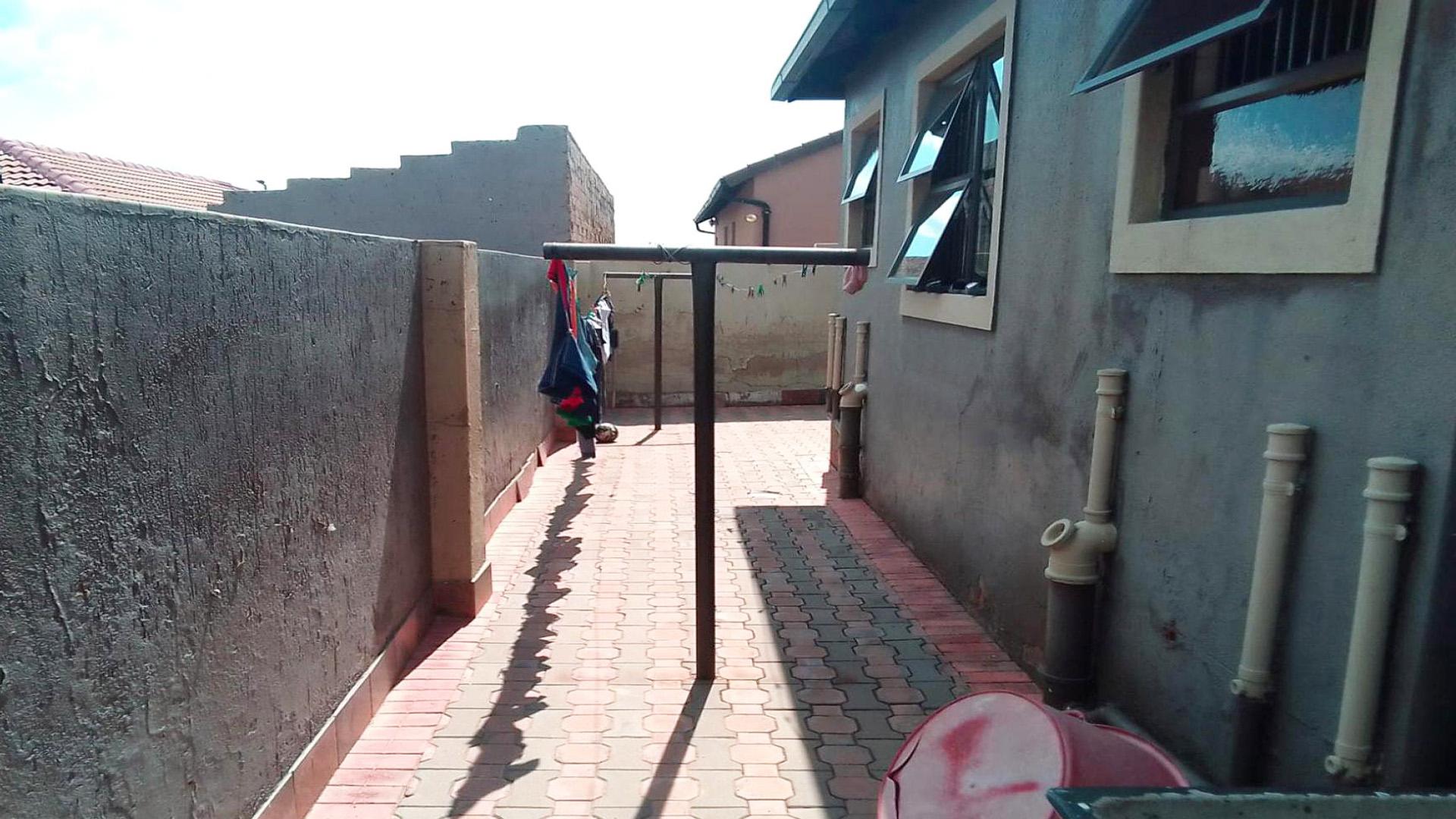 Backyard of property in Alveda