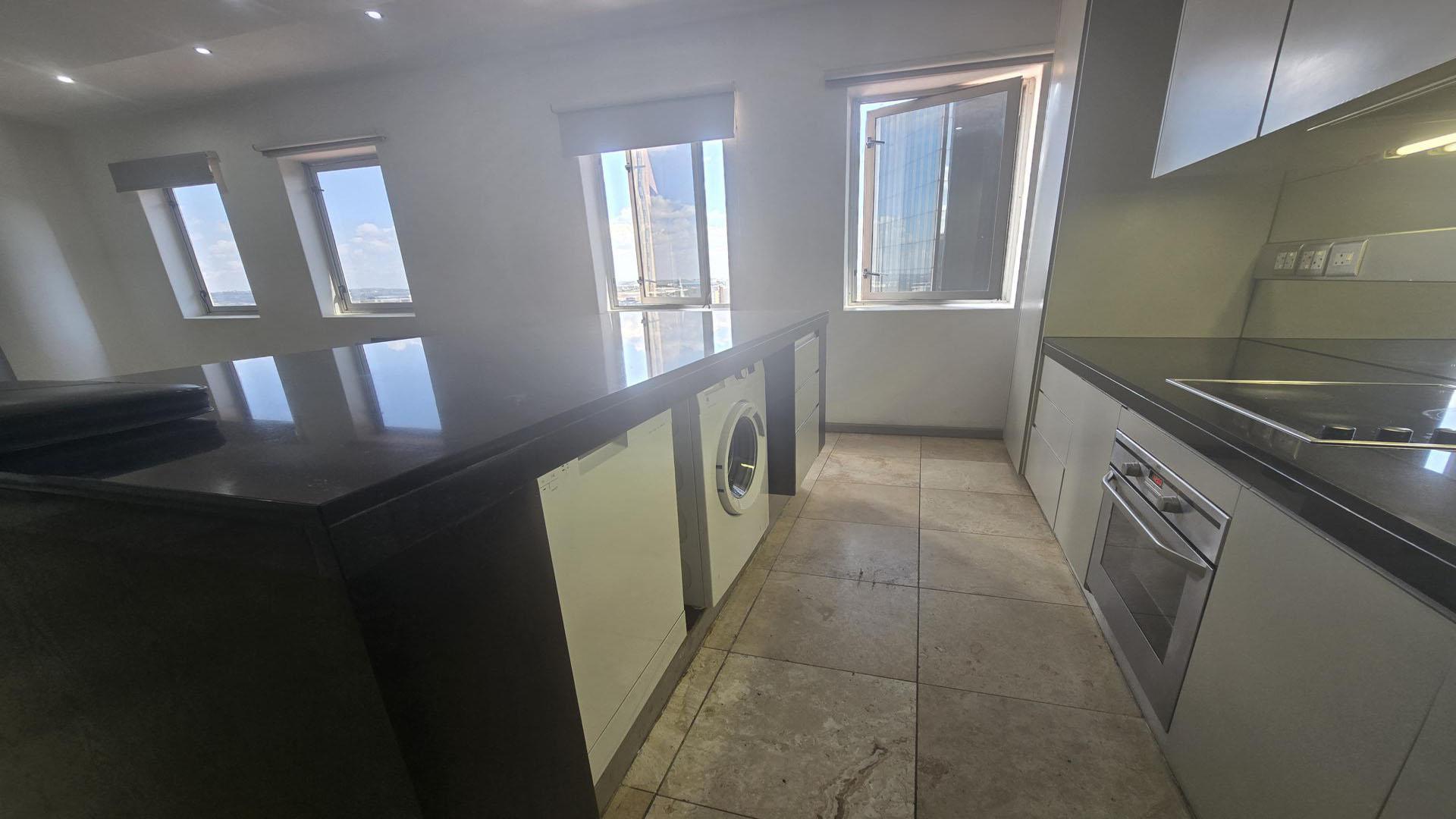 Kitchen of property in Johannesburg Central
