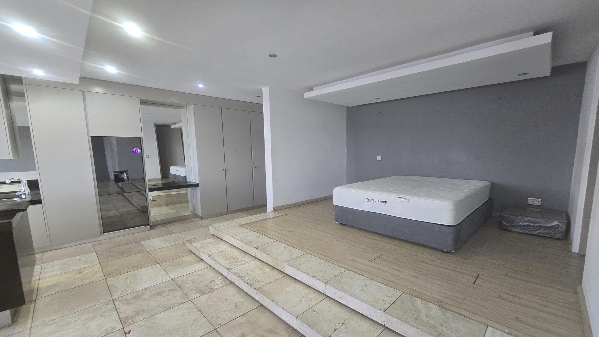 Bed Room 1 of property in Johannesburg Central