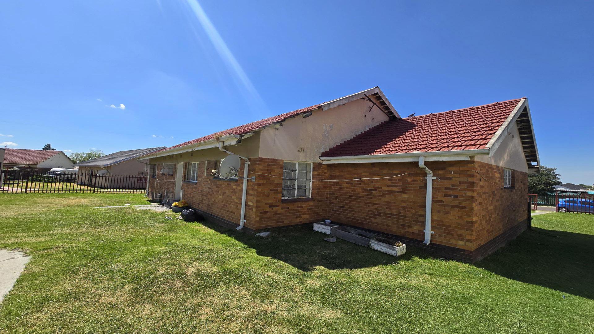 Backyard of property in Evander