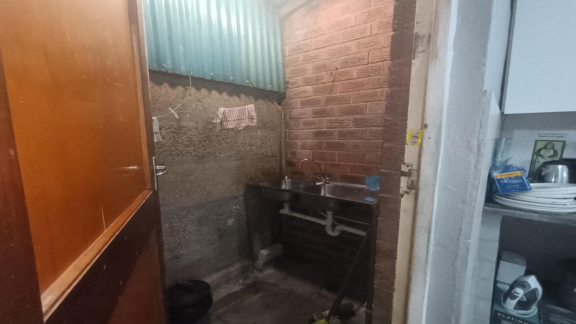 Scullery of property in Mitchells Plain