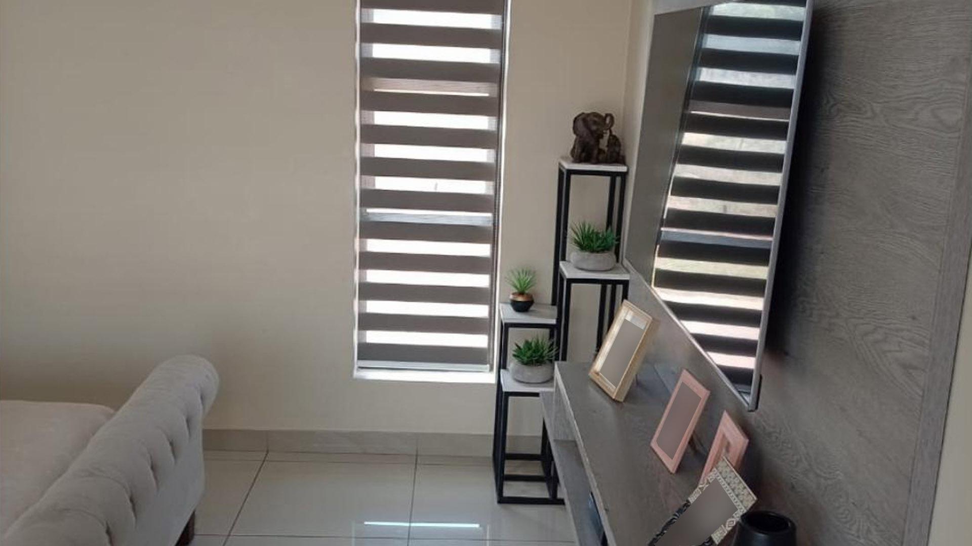 Bed Room 1 of property in Boardwalk Manor Estate