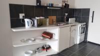Kitchen of property in City and Suburban