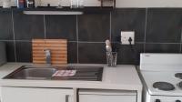 Kitchen of property in City and Suburban