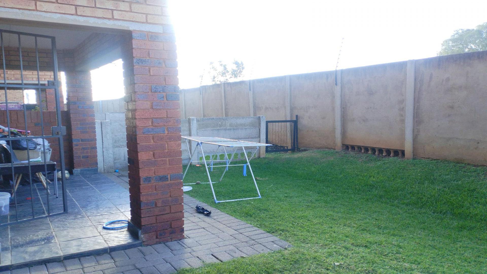 Backyard of property in Alveda