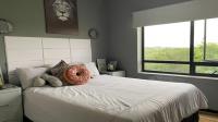 Bed Room 1 of property in Jackal Creek Golf Estate