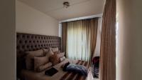 Main Bedroom - 17 square meters of property in Sundowner