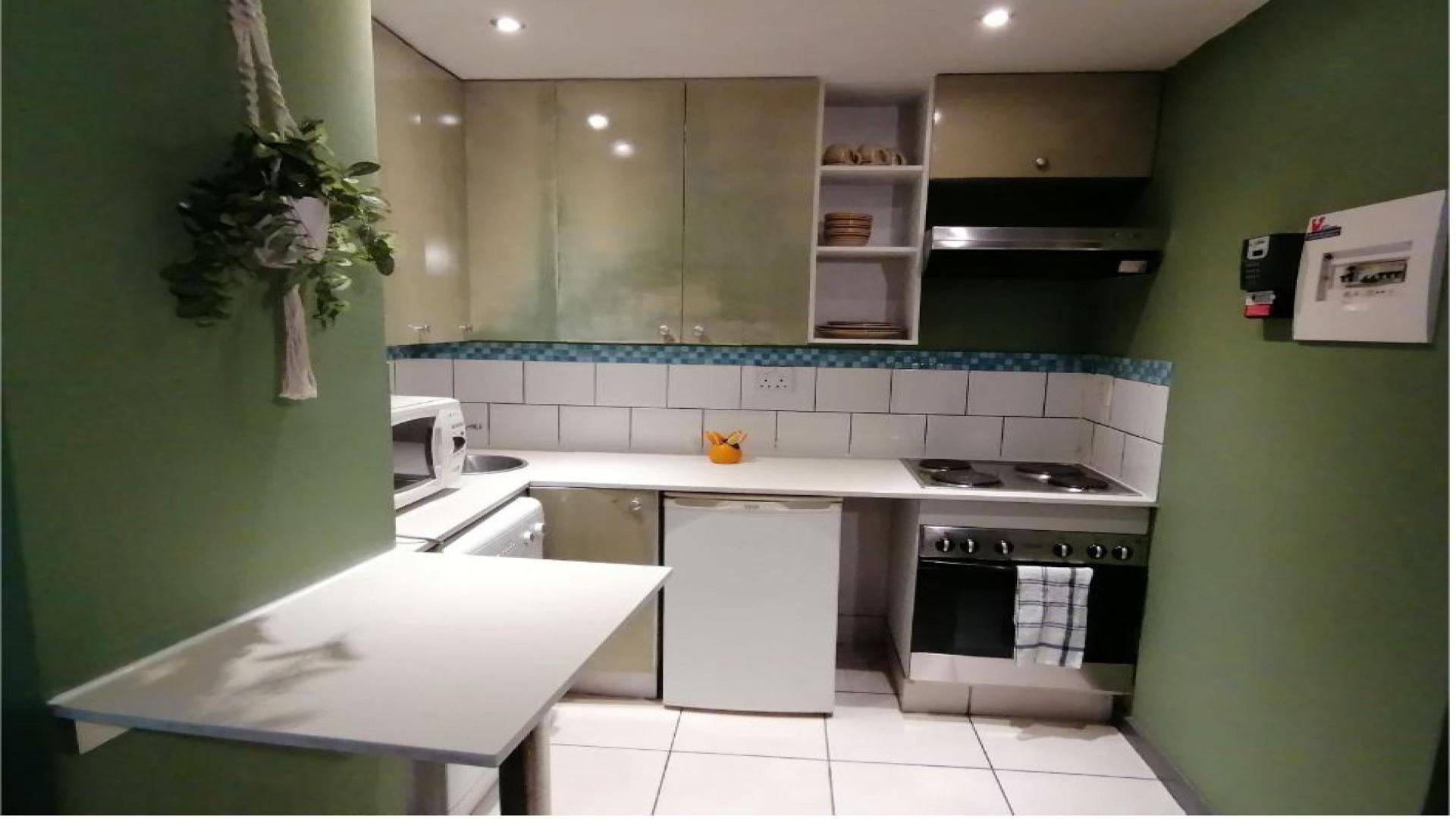Kitchen of property in Johannesburg Central