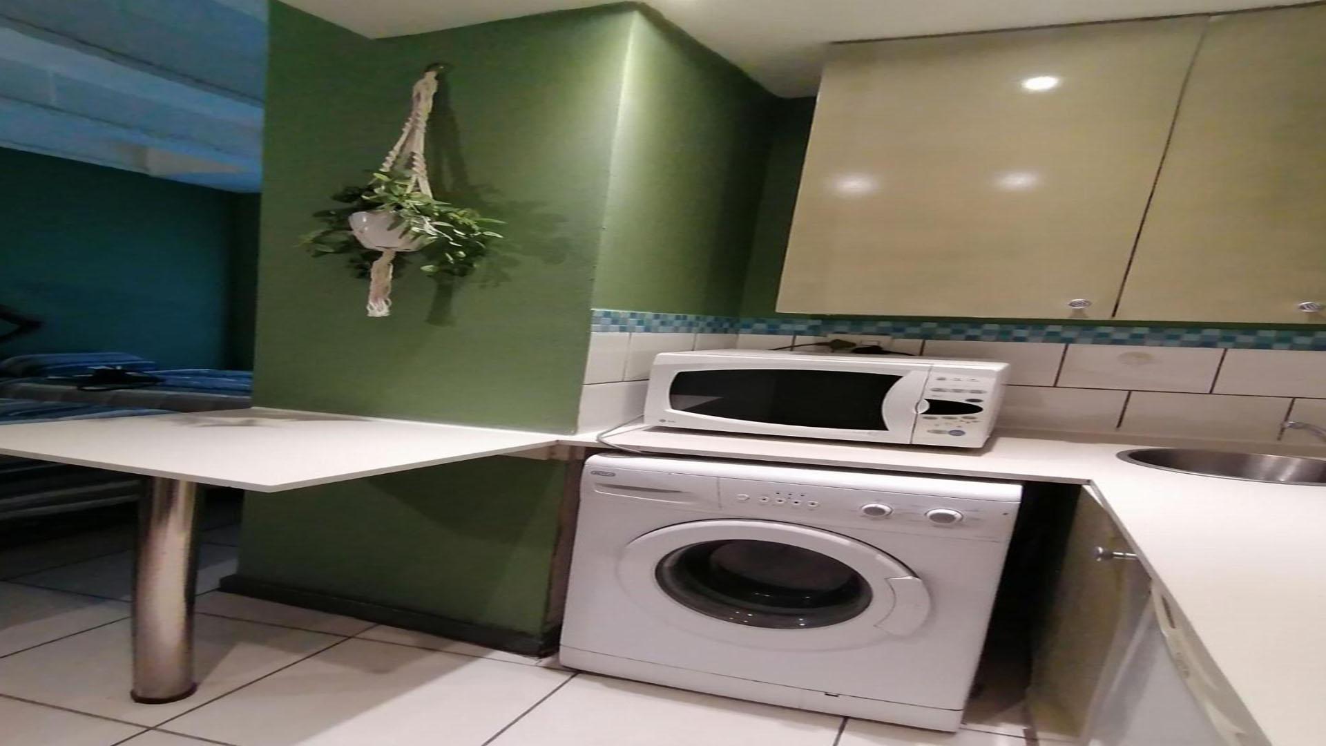 Kitchen of property in Johannesburg Central