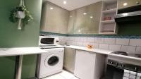 Kitchen of property in Johannesburg Central