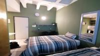 Bed Room 1 of property in Johannesburg Central