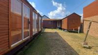 Backyard of property in Evander