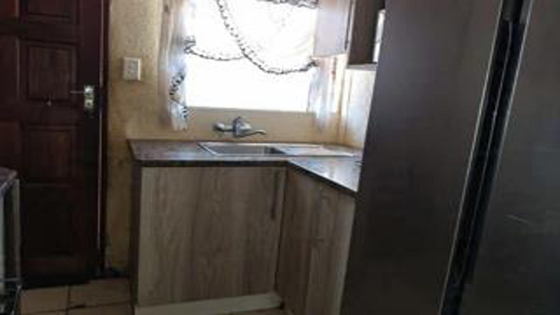 Kitchen of property in Tlhabane West