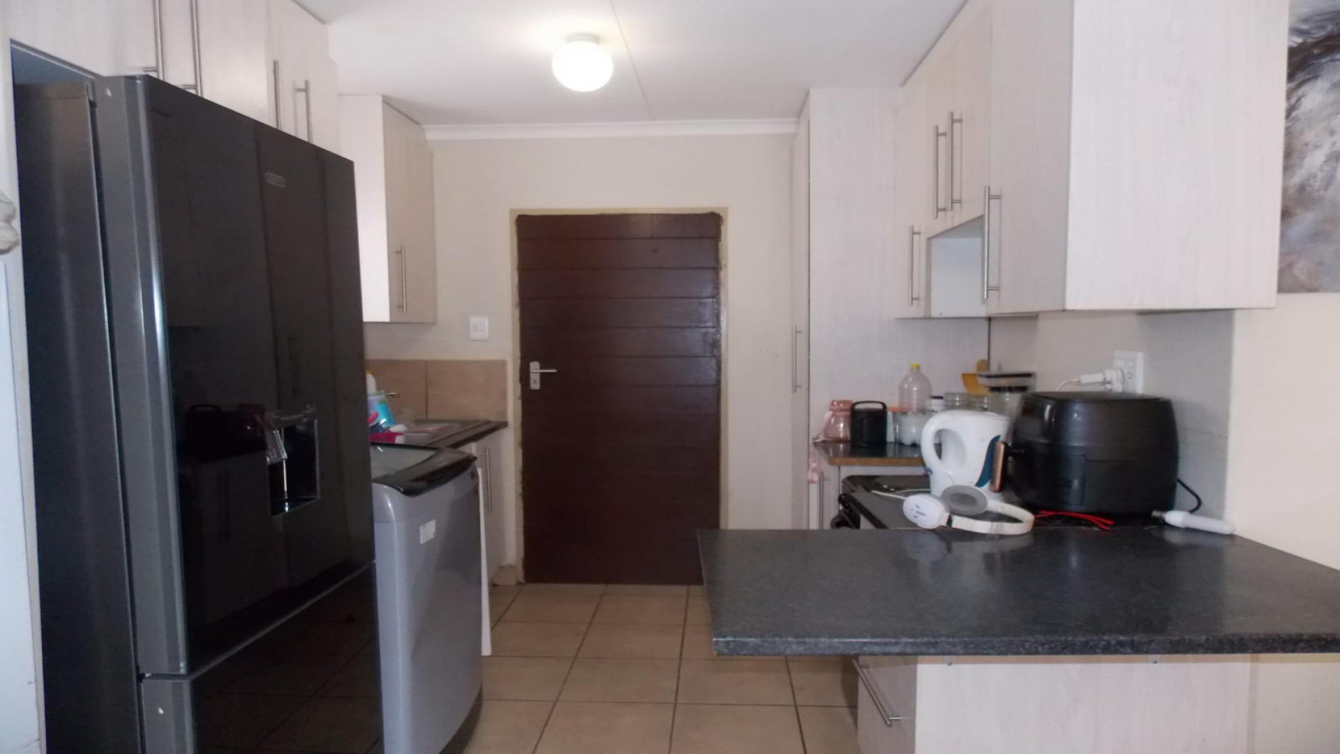Kitchen of property in Palm Ridge