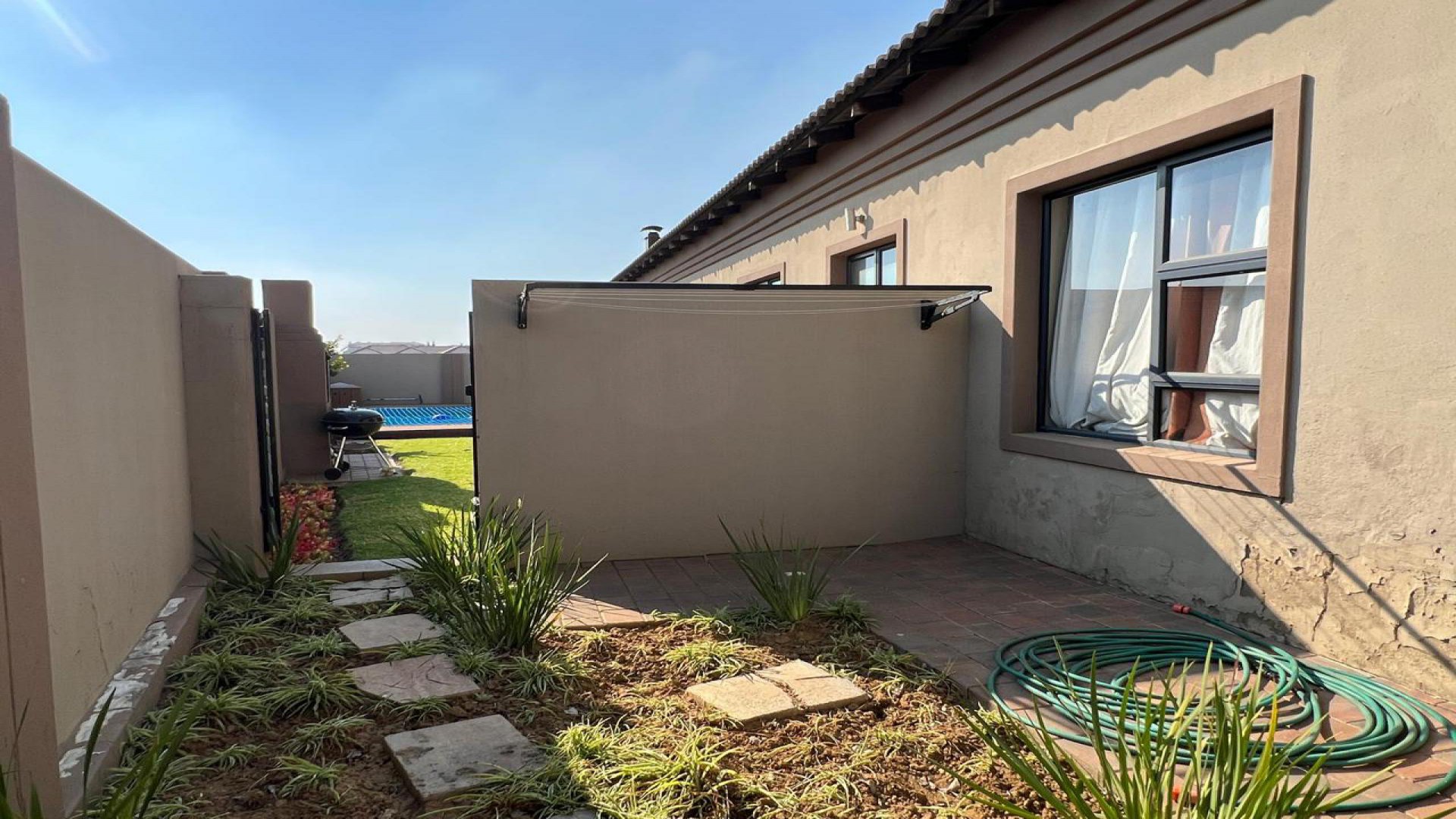 Backyard of property in Blue Valley Golf Estate