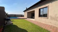 Backyard of property in Blue Valley Golf Estate