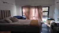 Bed Room 1 of property in Johannesburg Central