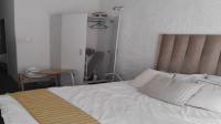 Bed Room 1 of property in Johannesburg Central