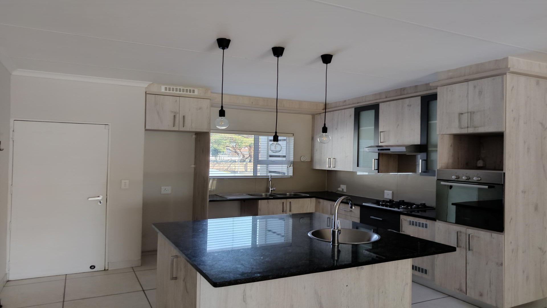 Kitchen of property in North Riding A.H.
