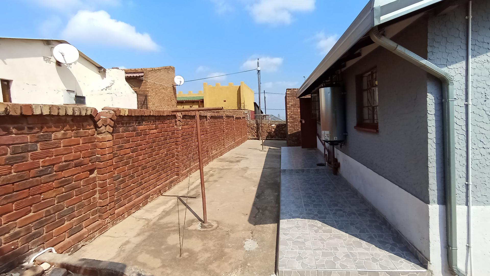 Backyard of property in Soshanguve