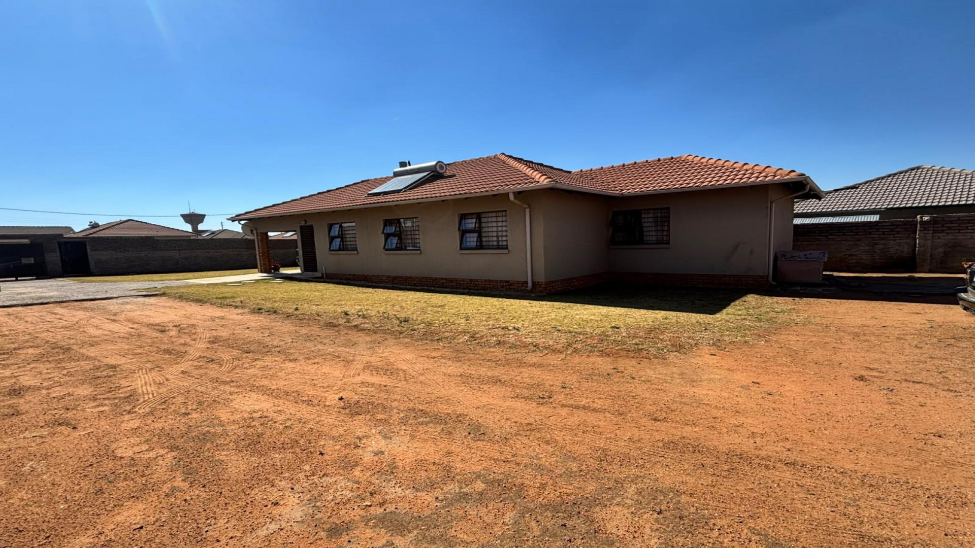 Backyard of property in Azaadville