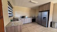 Kitchen of property in Azaadville