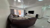 Lounges of property in Mooikloof Ridge