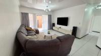 Lounges of property in Mooikloof Ridge