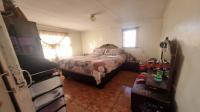Bed Room 1 of property in Lotus Gardens