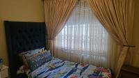 Bed Room 1 of property in Bloubosrand