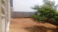 Backyard of property in Palm Ridge
