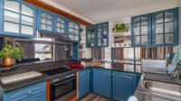 Kitchen of property in Manaba Beach