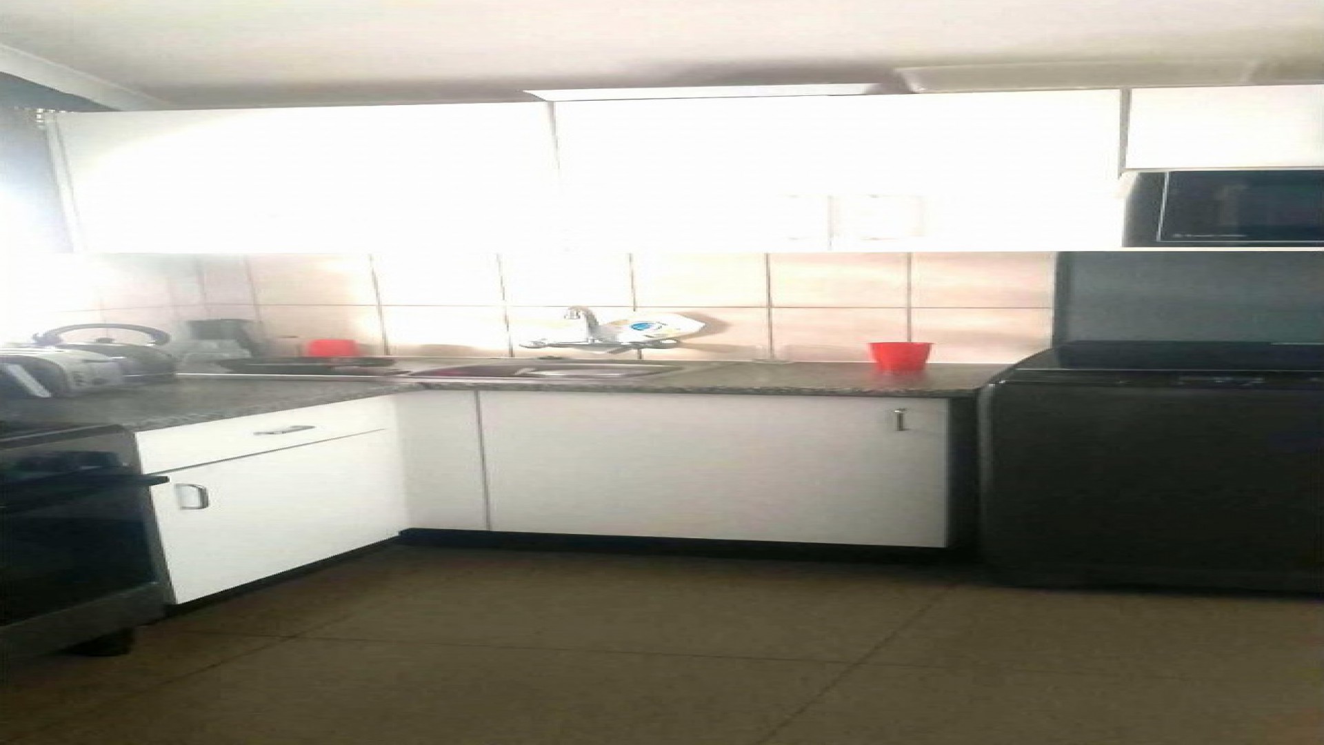 Kitchen of property in Lenasia South