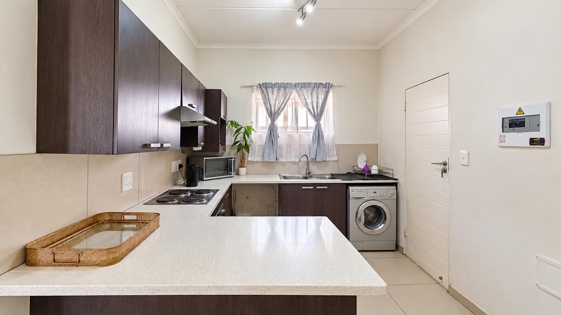 Kitchen of property in Sandton
